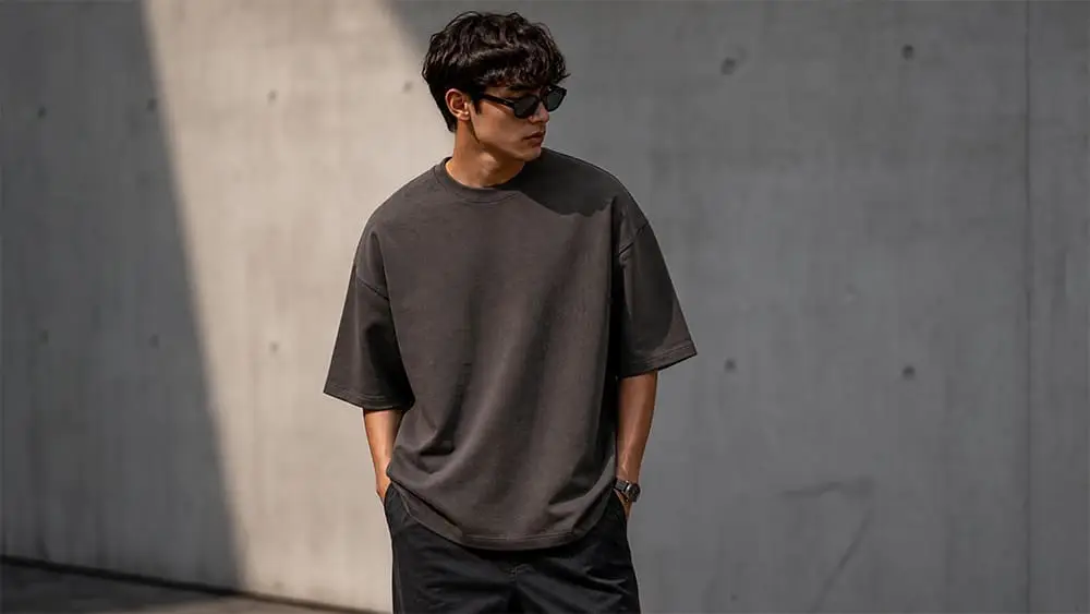 Model wearing a structured oversized heavyweight streetwear t-shirt.
